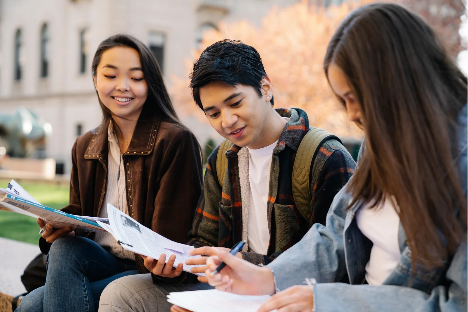 Students reviewing study materials together