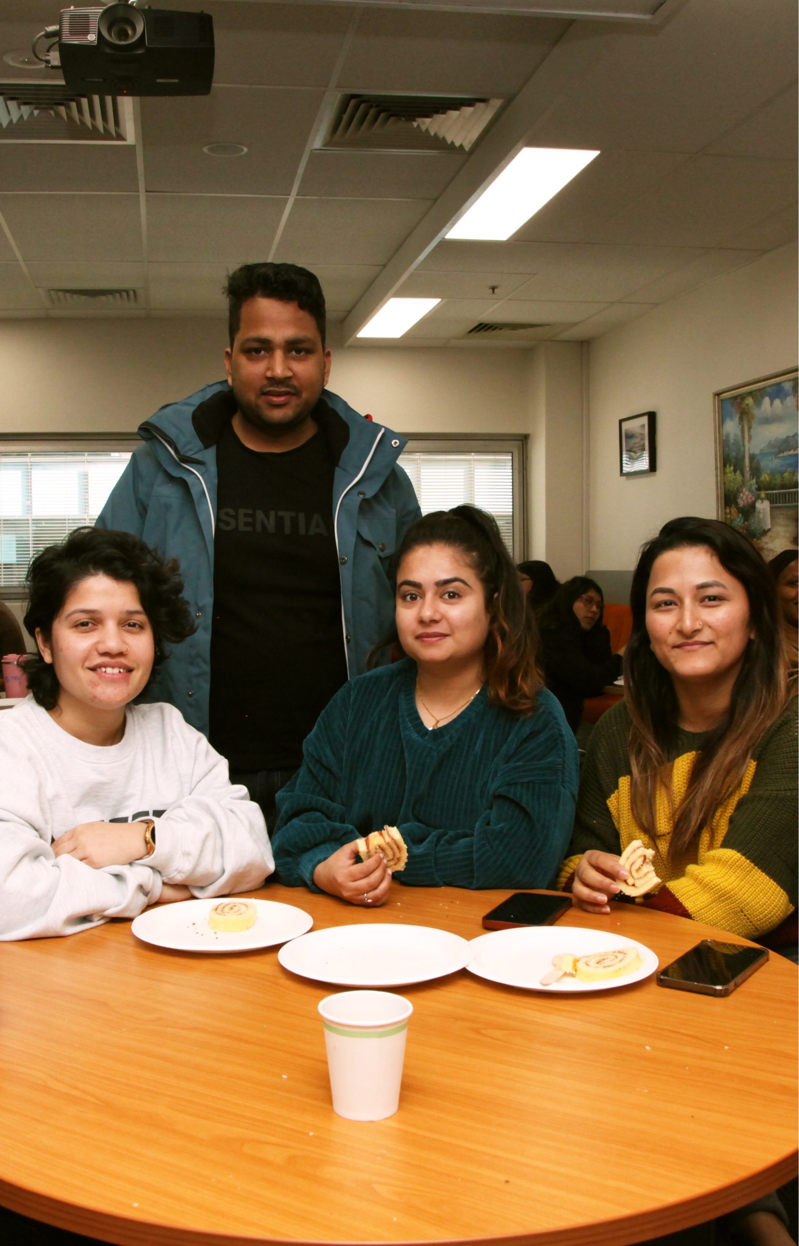 TIIS students working together around a table